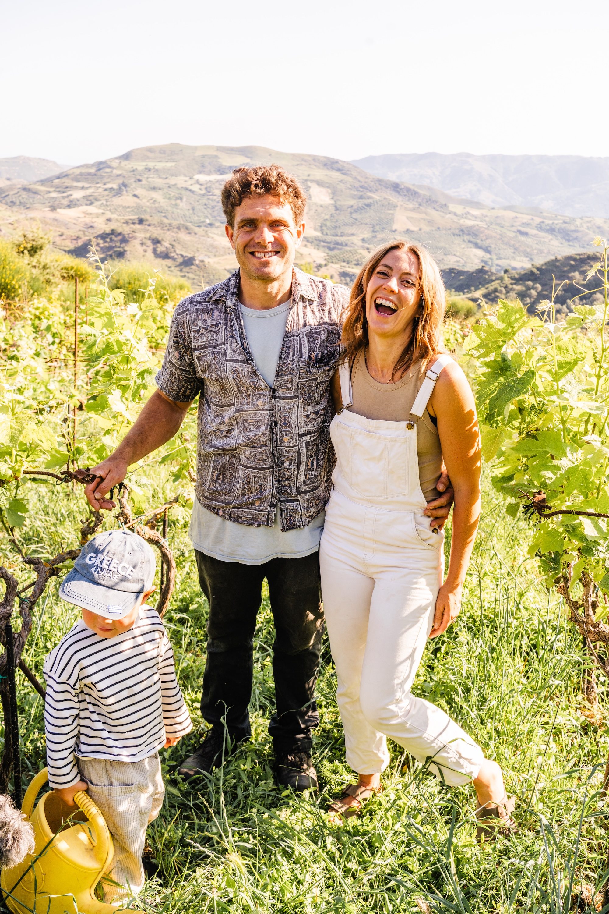 The Kairos Wines family in the vineyard with the Kedros mountain range beyond